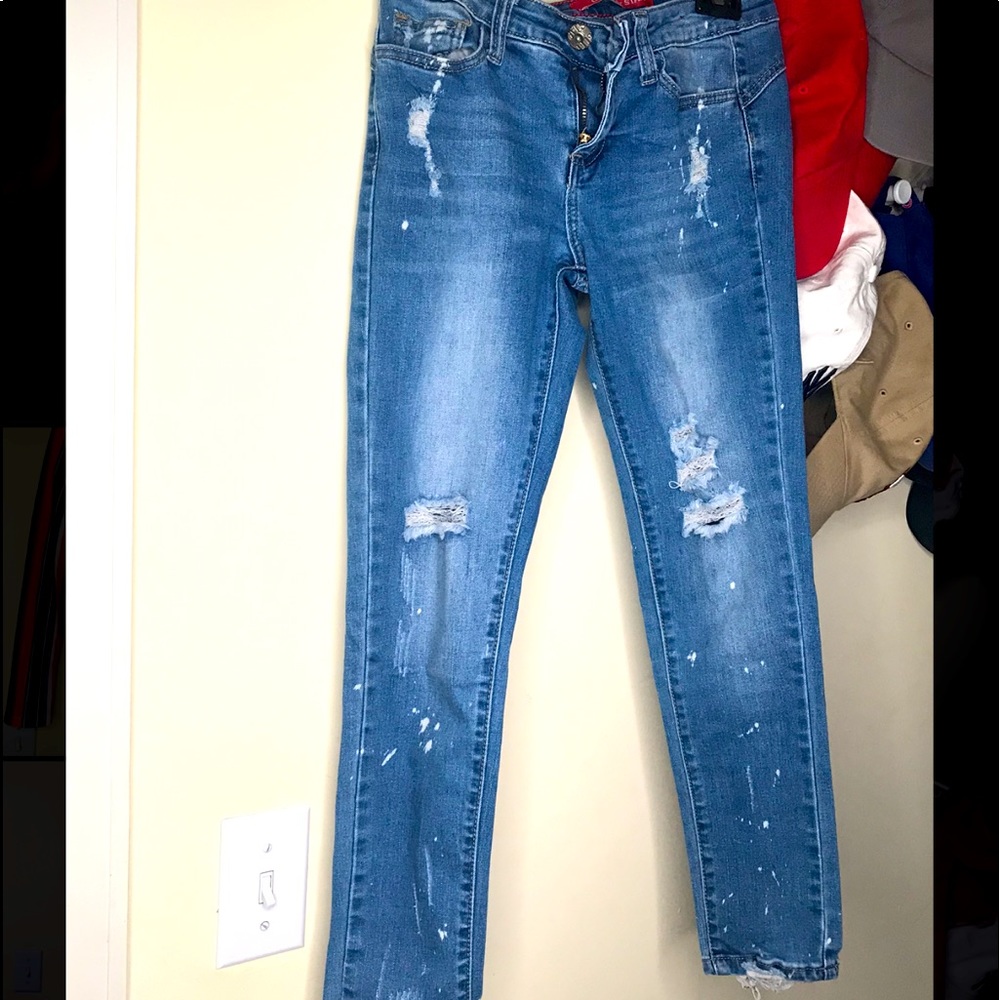 Distressed Jeans .
